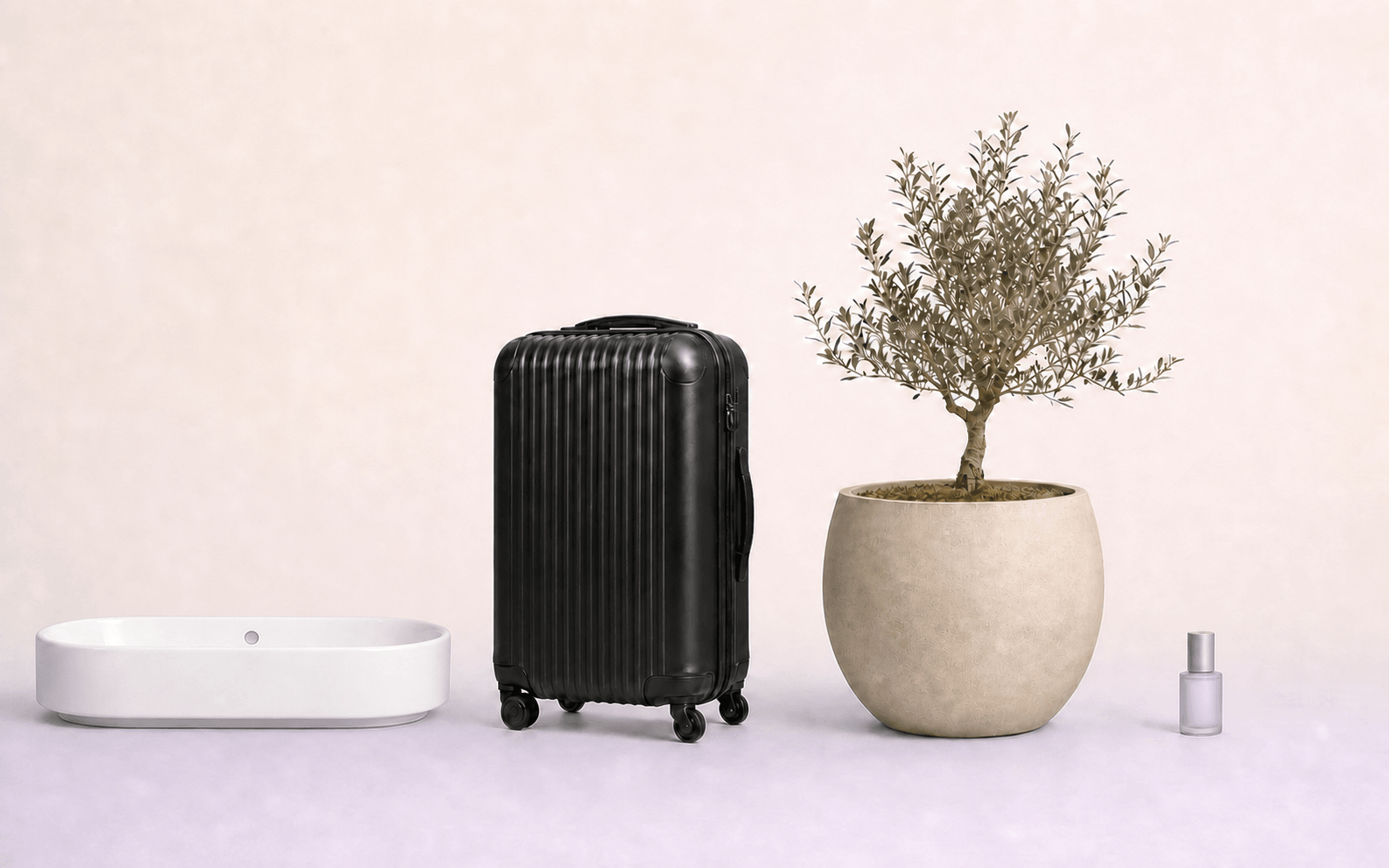A washbasin, suitcase, planter and perfume bottle shown at a recognizable scale