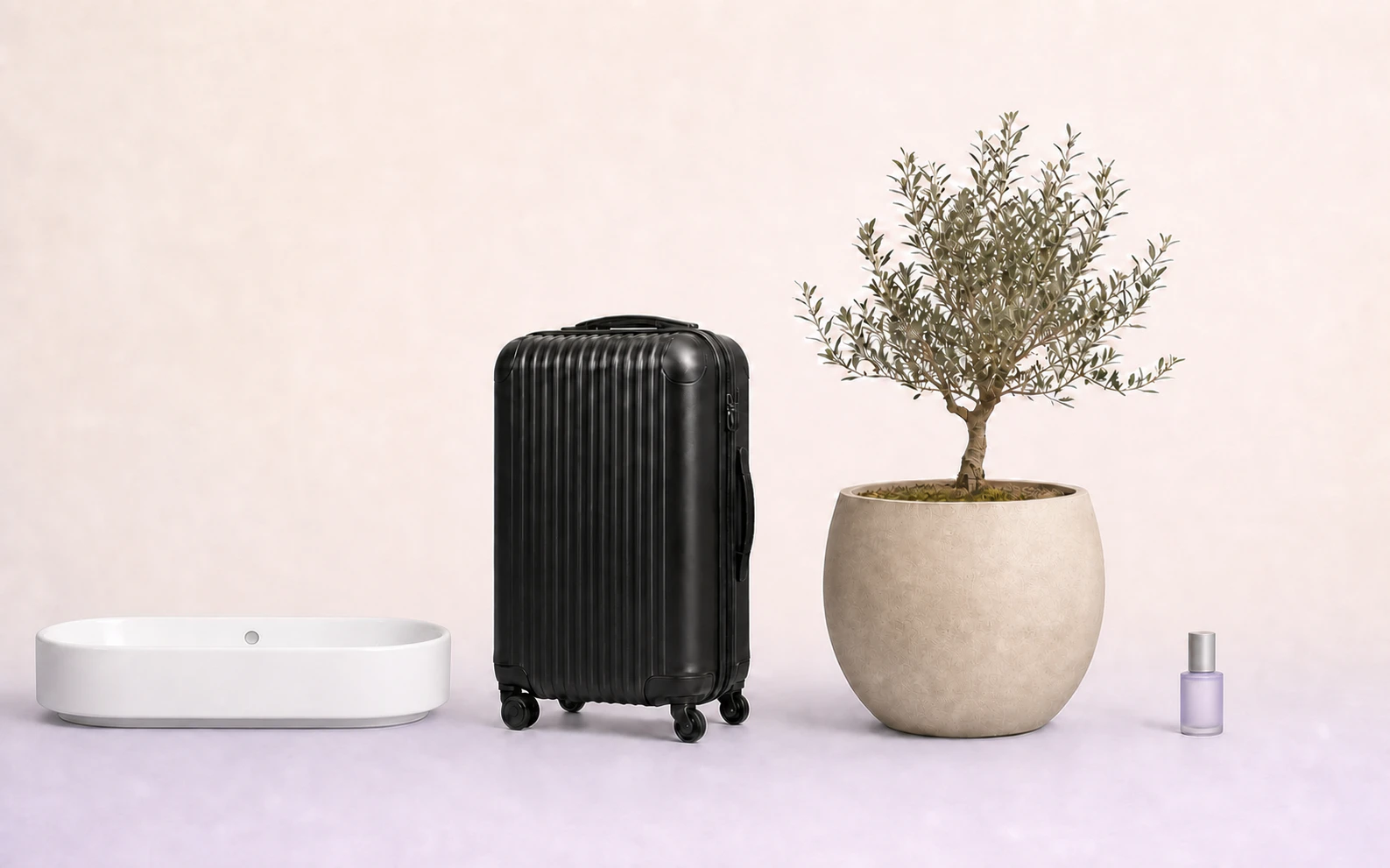 A washbasin, suitcase, planter and perfume bottle shown at a recognizable scale