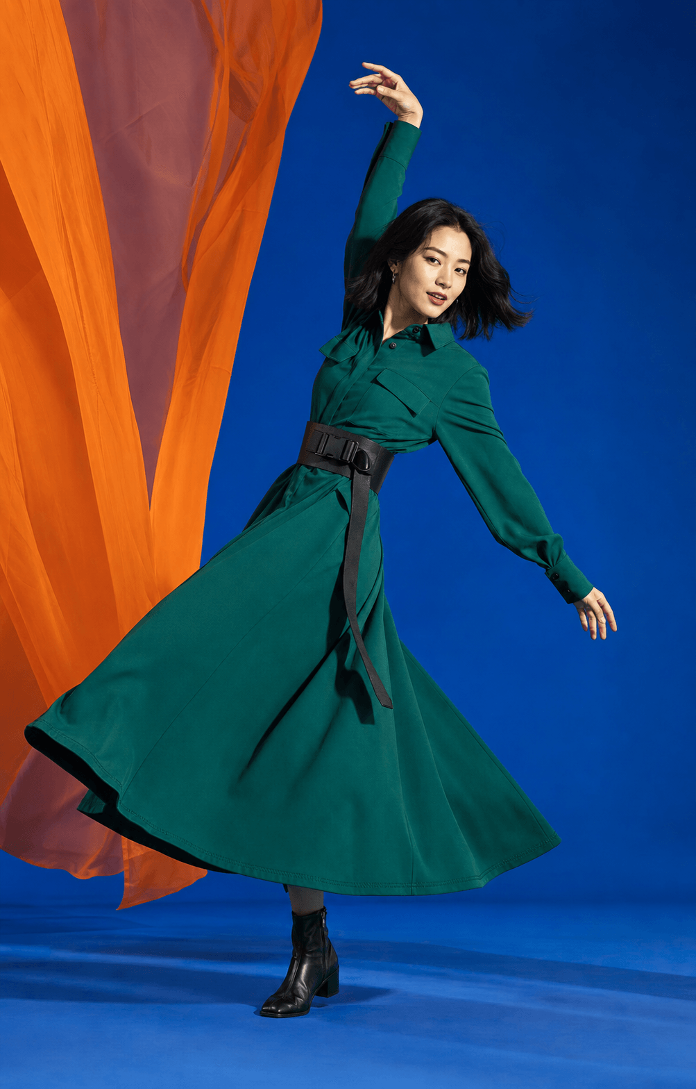 AI house model in green dress during a dynamic spin