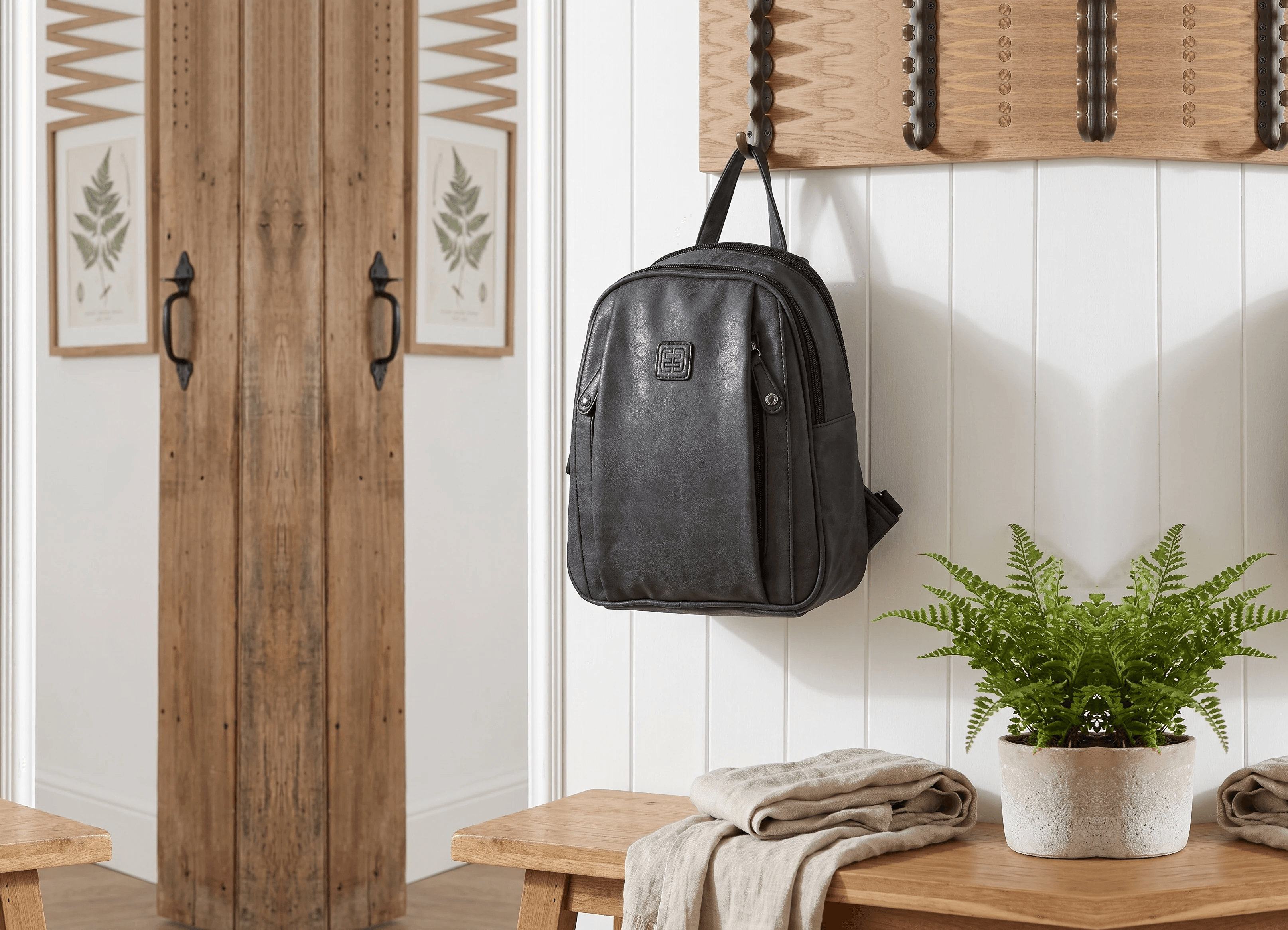 Black Enrico Benetti backpack believably to scale in a warm interior
