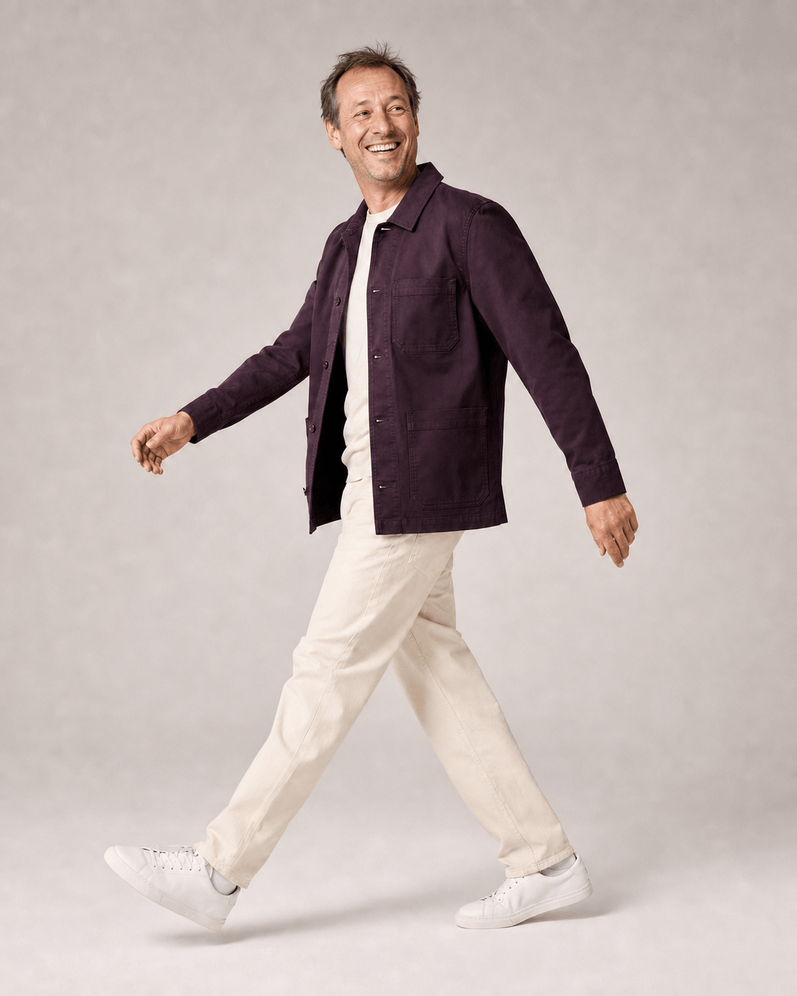 Colleague in a Smiling, Dynamic Walking Pose