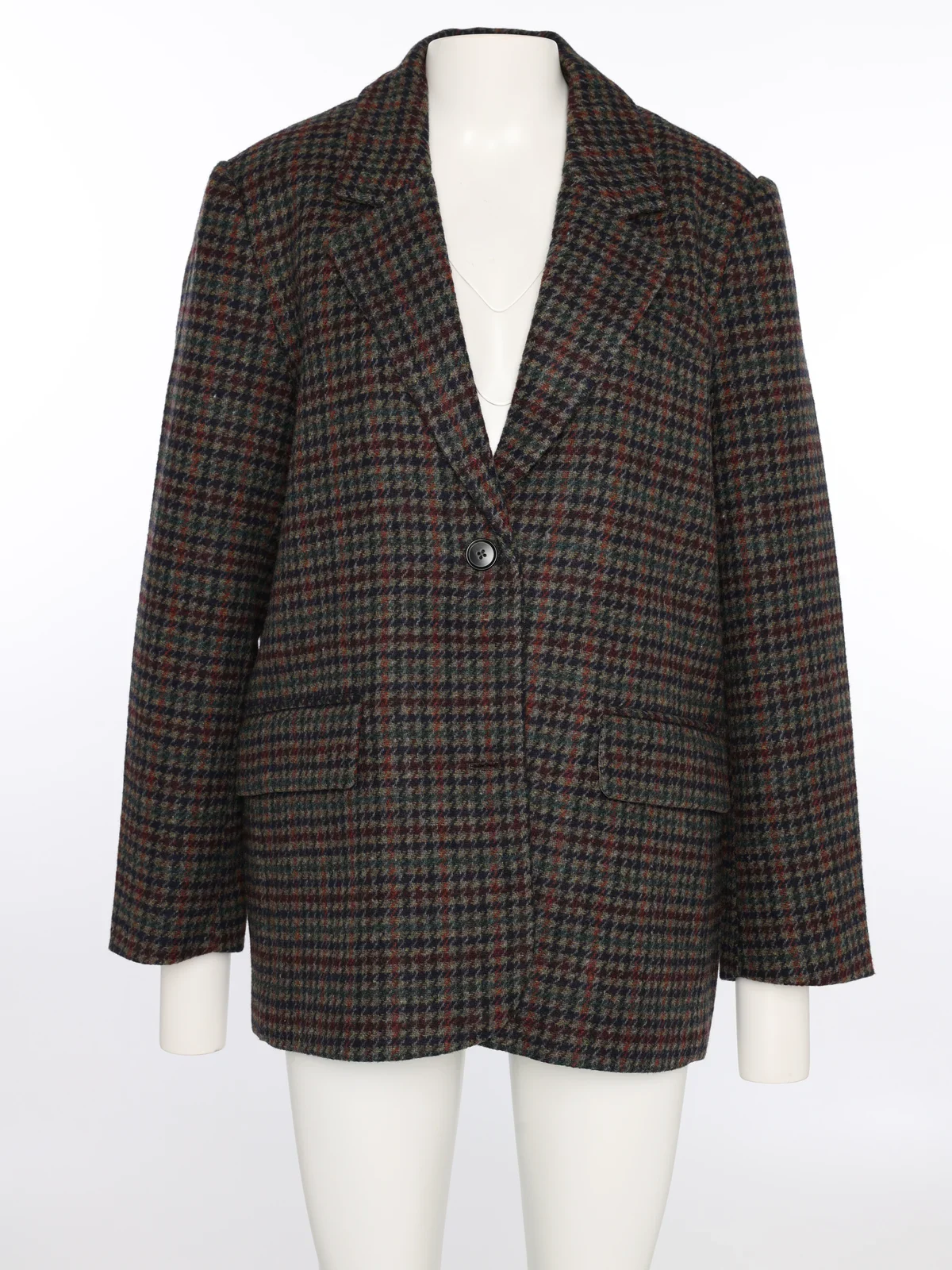 The same checkered blazer on a mannequin