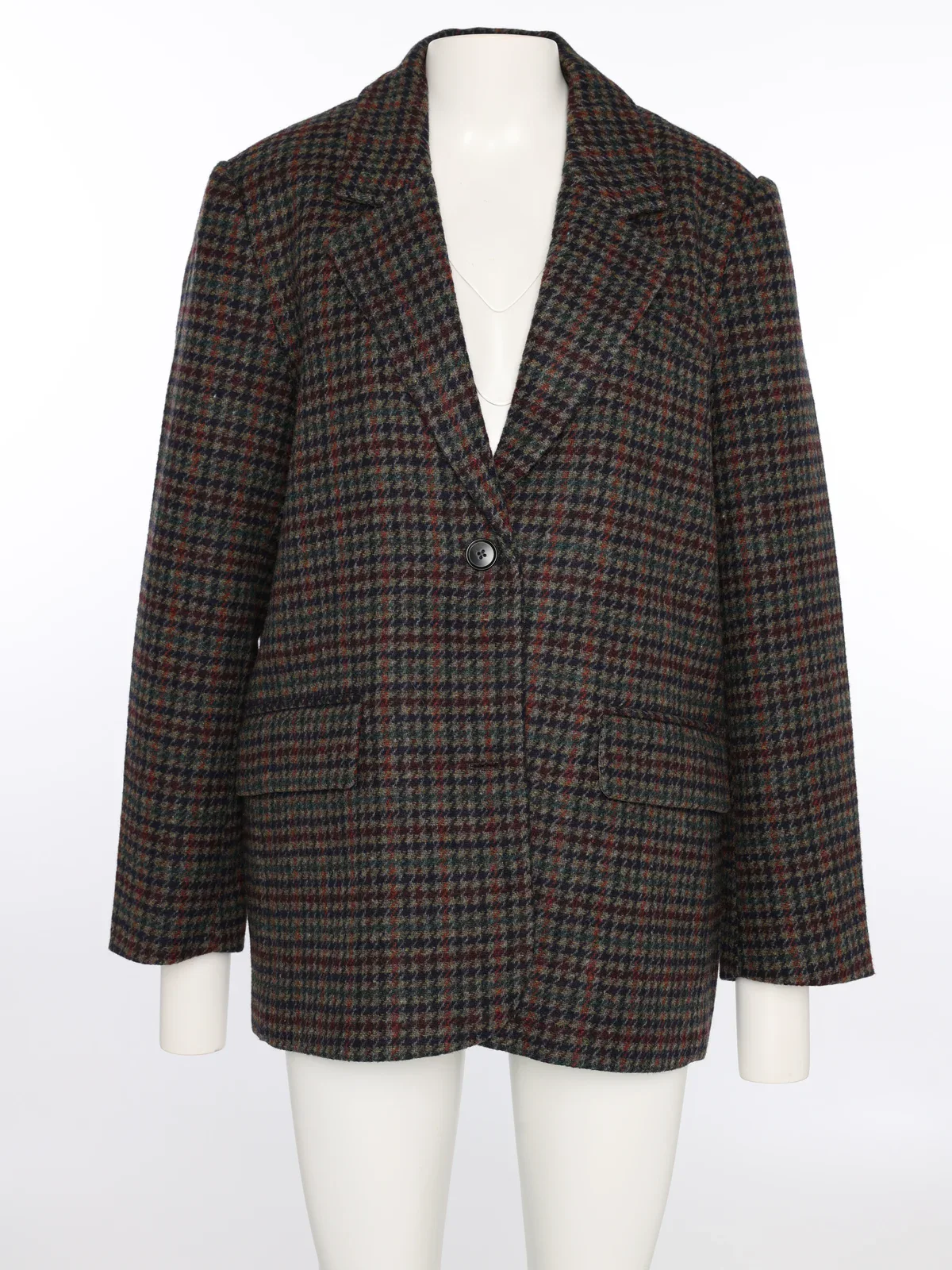 The same checkered blazer on a mannequin
