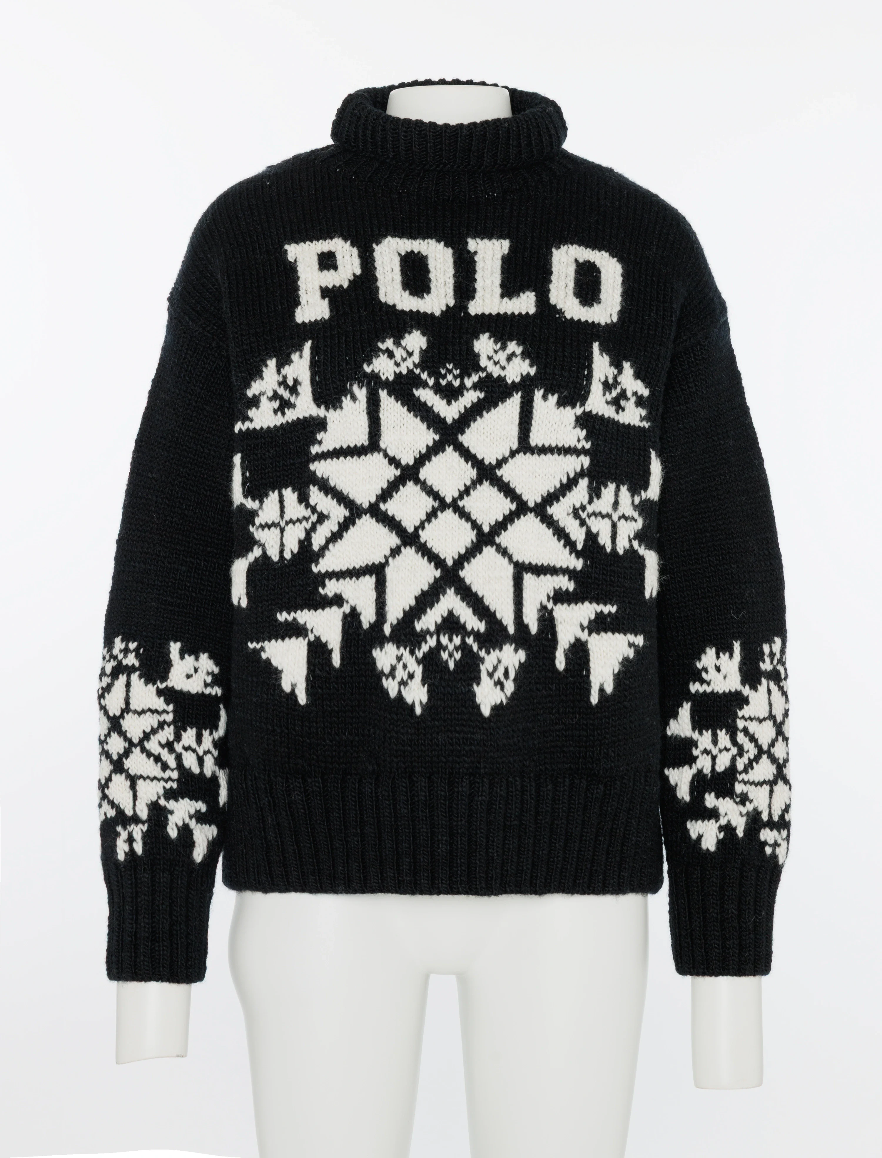 Black turtleneck with POLO letters and snowflake pattern on a mannequin in the studio