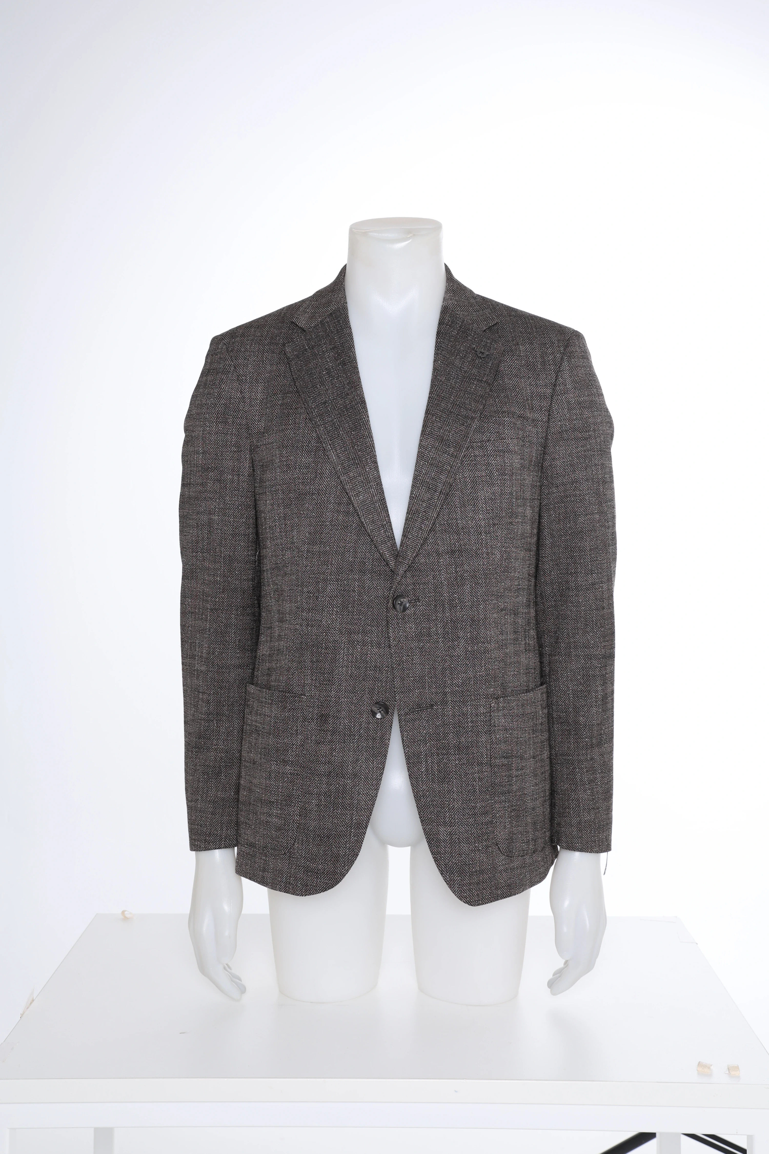 Tweed blazer on a mannequin in the studio